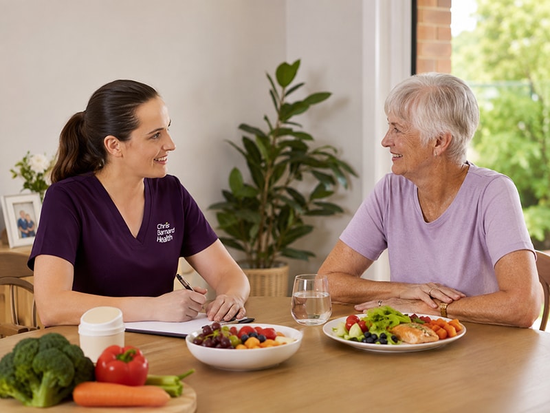 Dietitian discussing healthy food choices and nutrition with an older person